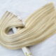 Pure color 60# wholesale blond bundles invisible unprocessed weft vendor tape hair extensions